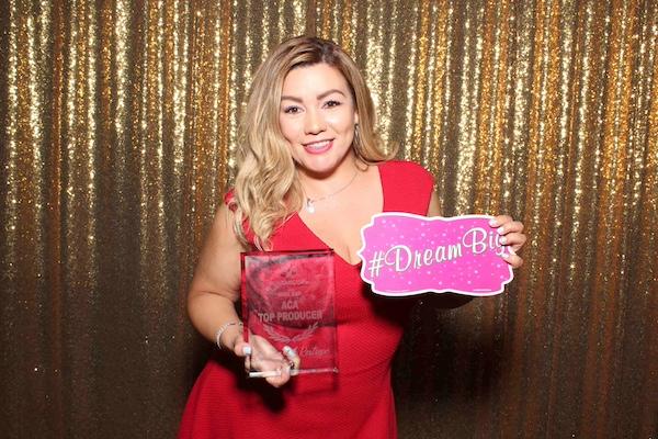Guest holding award prop