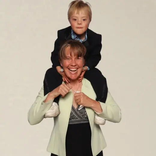 Grandmother and grandson laughing together